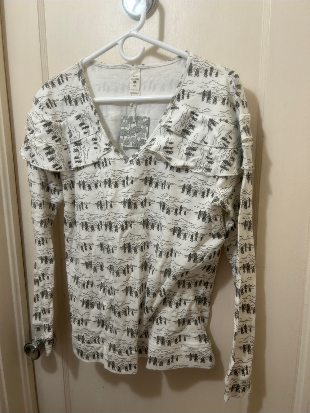 Kate Quinn little mountain ruffle v-neck top